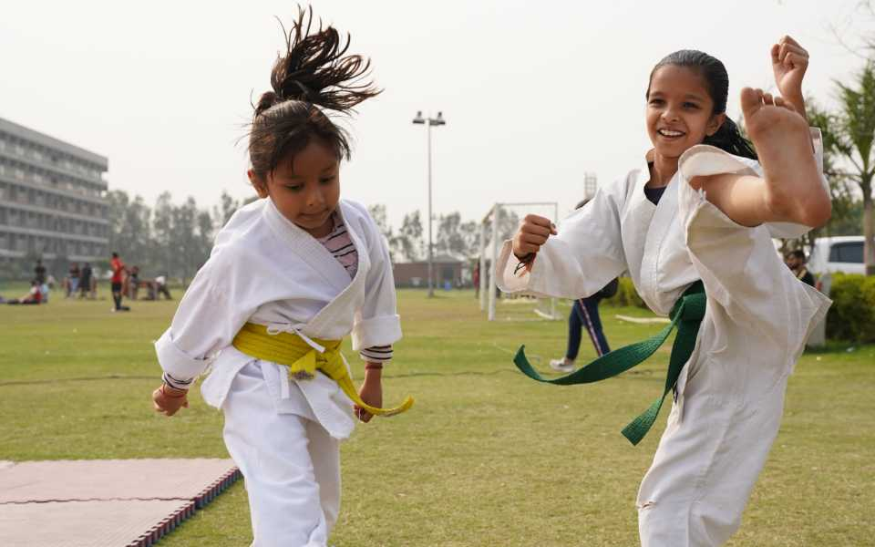 Kids enjoy karate and martial arts as beginners. 
