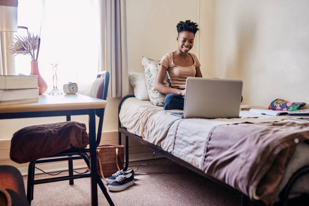 A student in her apartment.