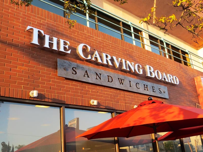 Illuminated front-lit channel letters for the Carving Board Sandwiches restaurant sign in Woodland Hills.