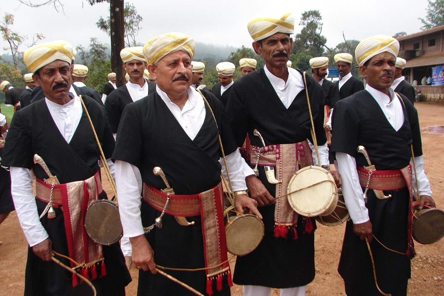 men in kodagu dressed up in karnataka traditional dress - Kupya.