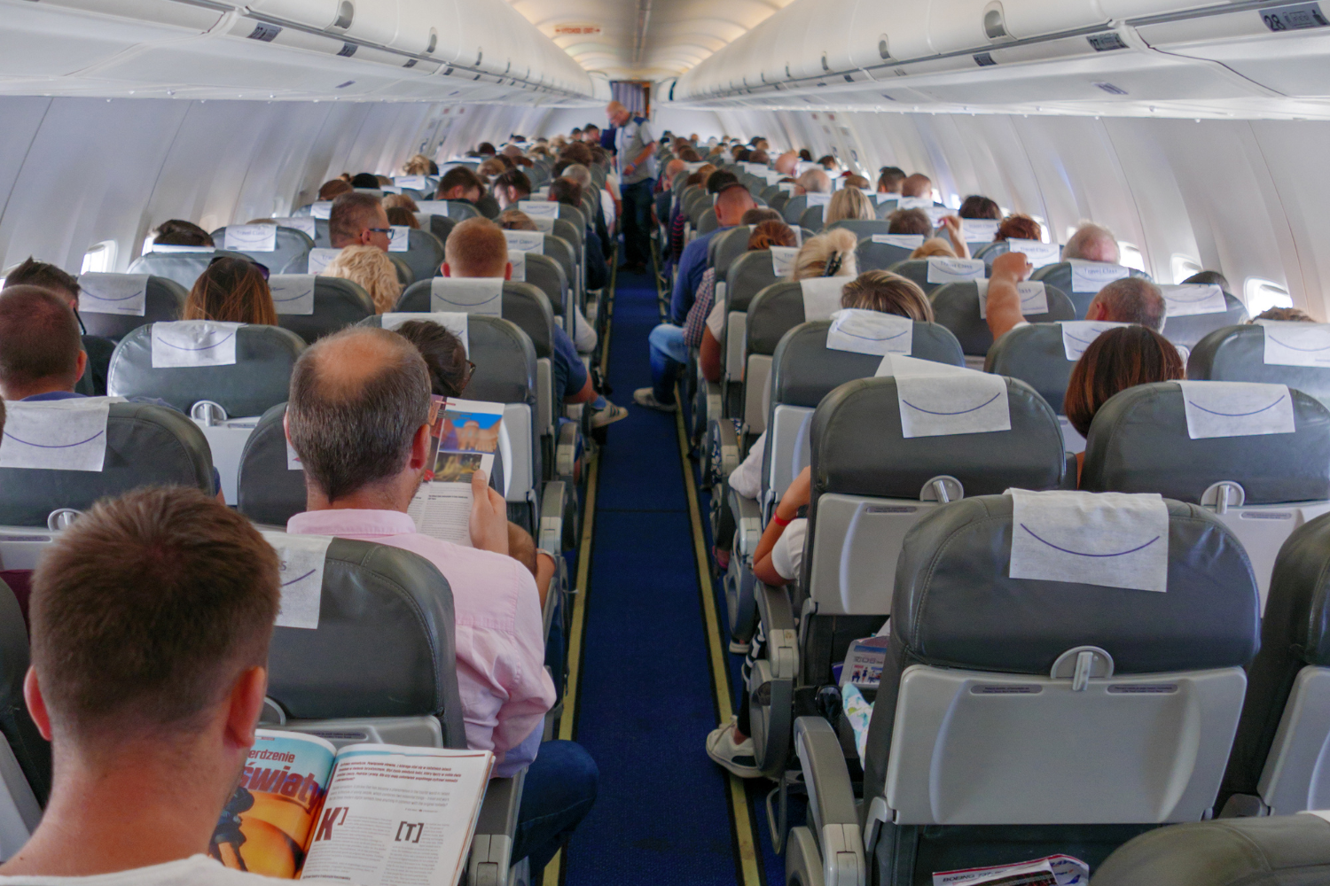 passengers seated inside spirit airlines flight