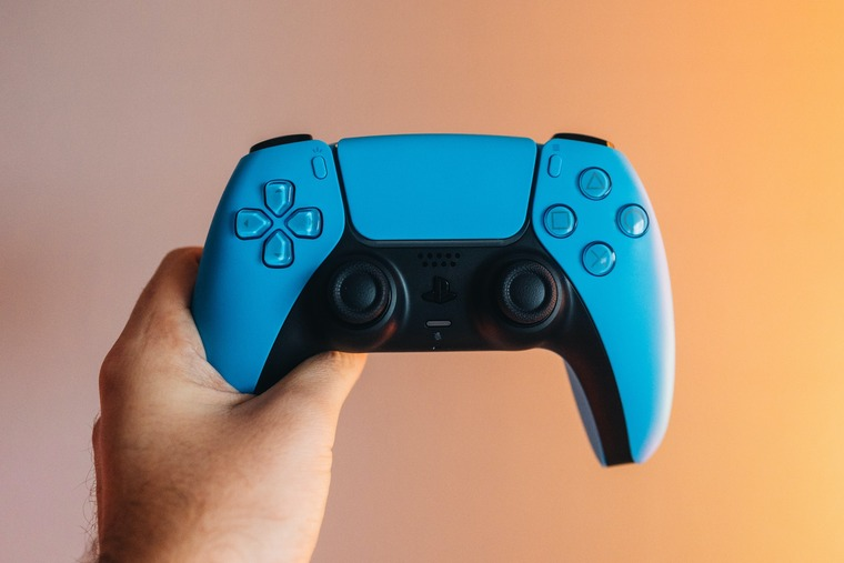 Liven up your gaming with a colorful DualSense controller, cheap. (Image Source: Kamil S. on Unsplash.com)
