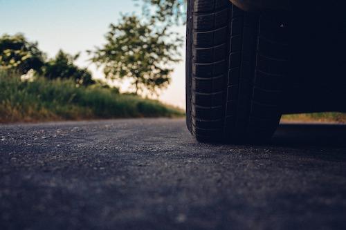 Car tires on a New England road trip