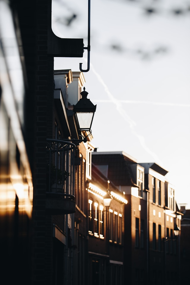 Evening light in a street in Leeuwarden, The Netherlands, with a classic-style street light