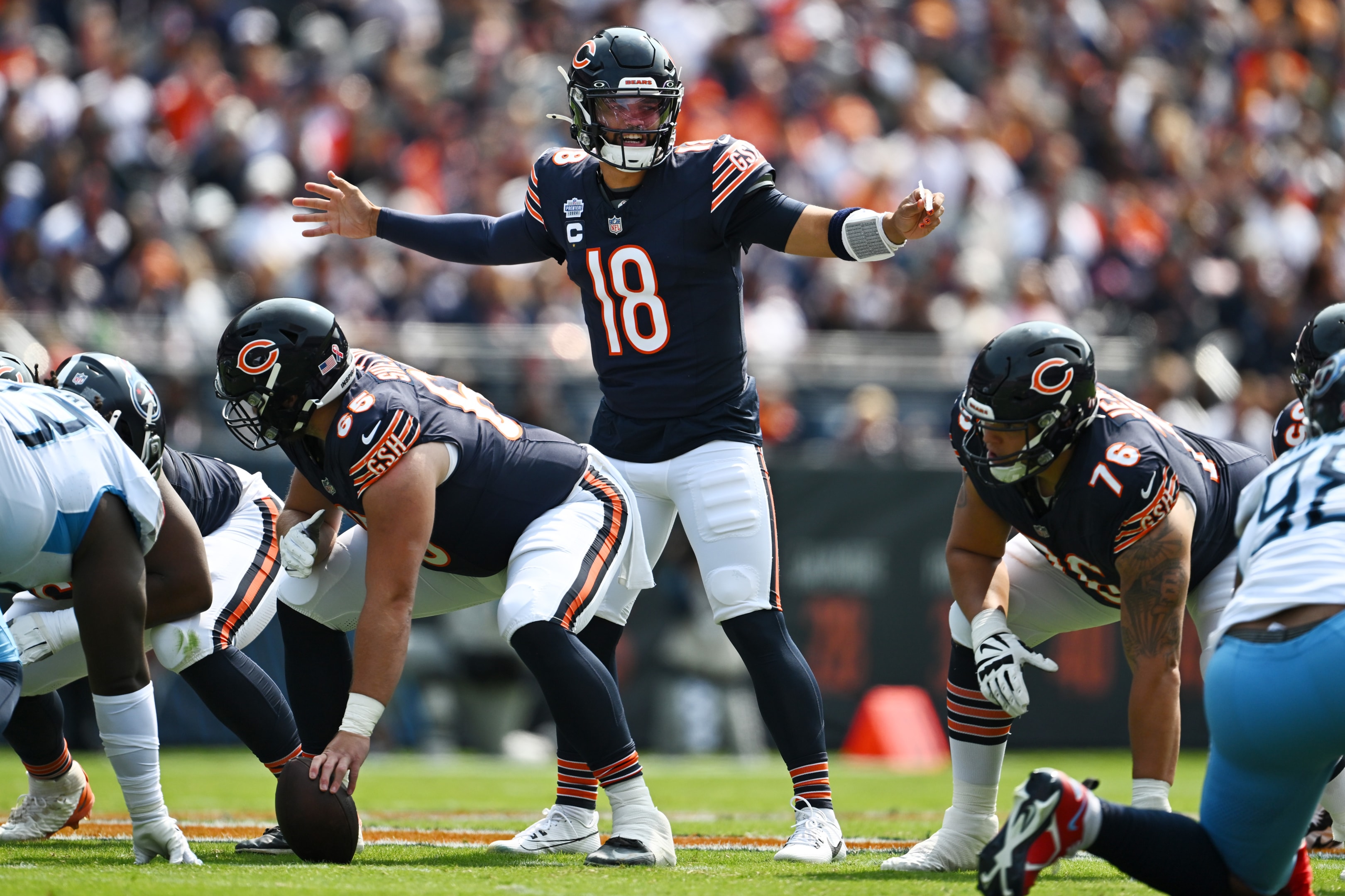 Caleb Williams of the Chicago Bears gestures at the line of scrimmage in the first quarter of a game at Soldier Field on September 08, 2024 in Chicago, Illinois.