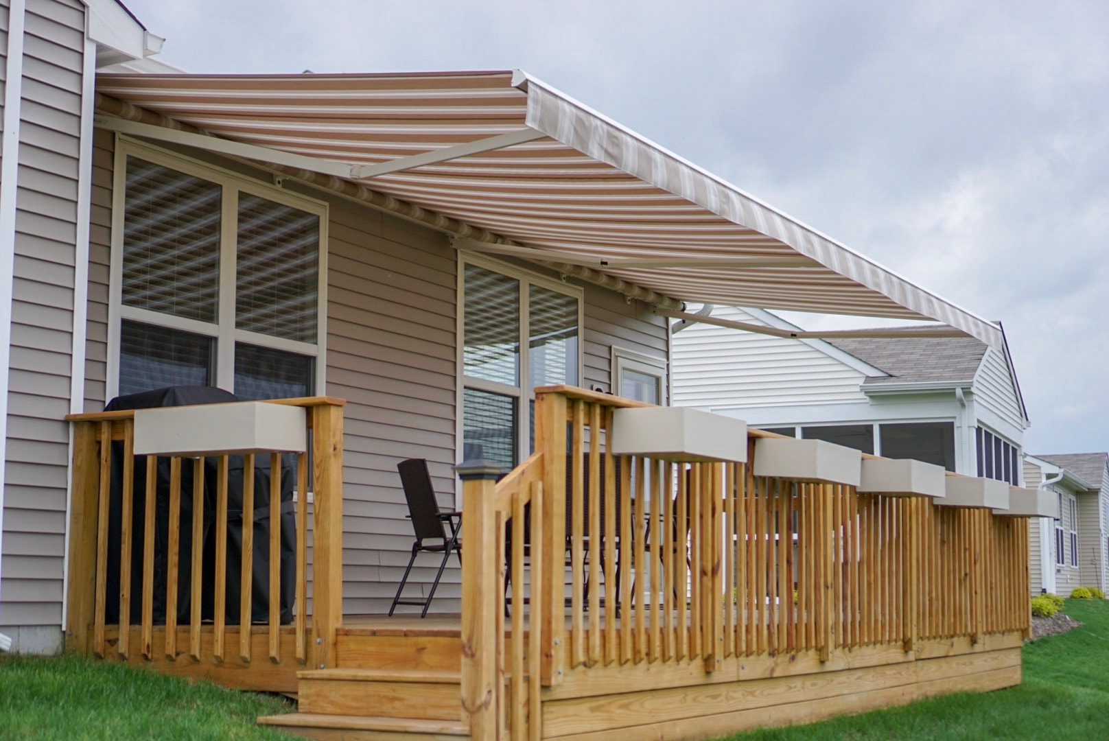 Protect your furniture with a fabric style retractable awning.