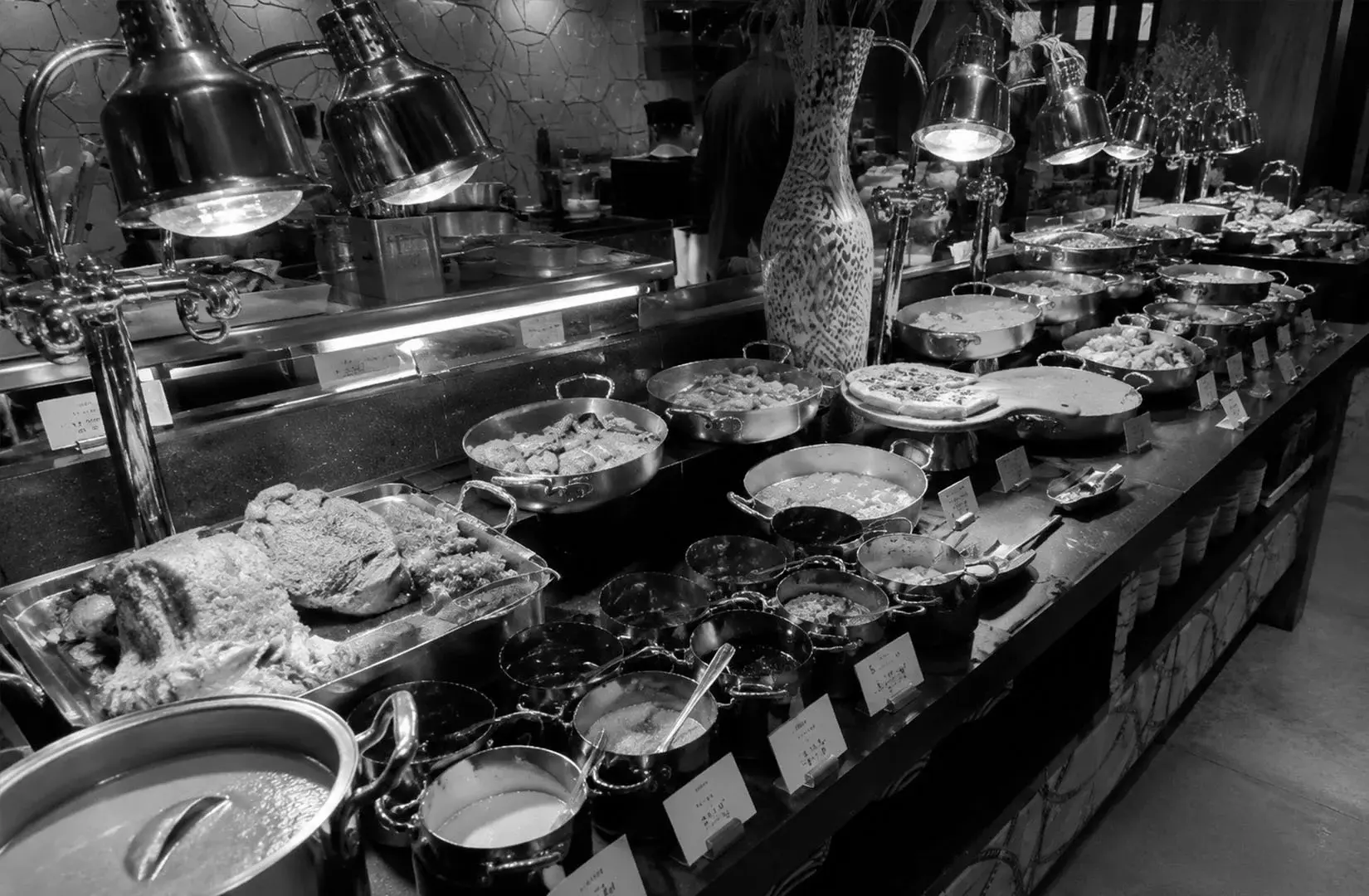Colony Singapore buffet food display featuring assorted dishes and buffet stations
