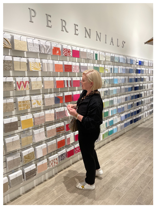 Perennial Fabrics showroom with Laura looking at samples for furniture