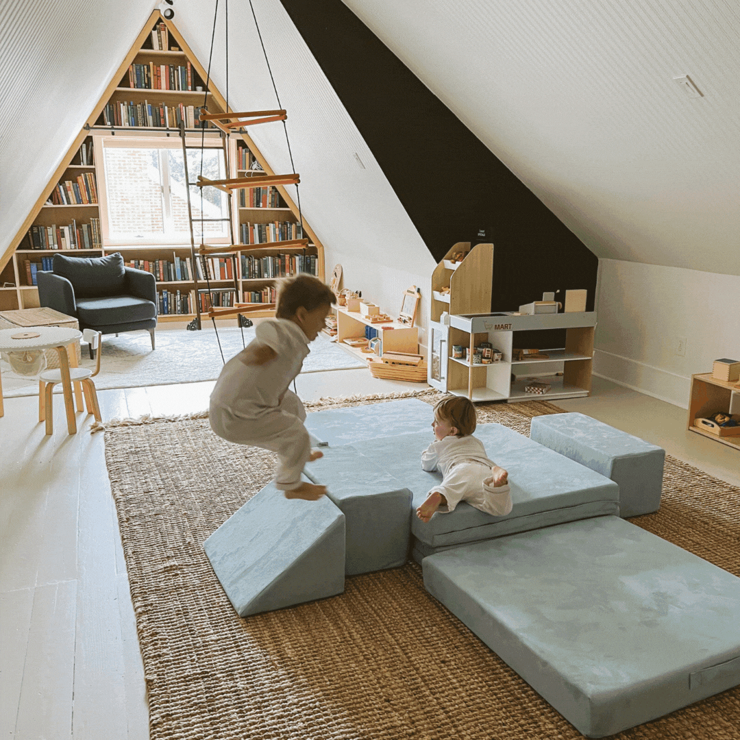 Kids jumping on a figgy play couch