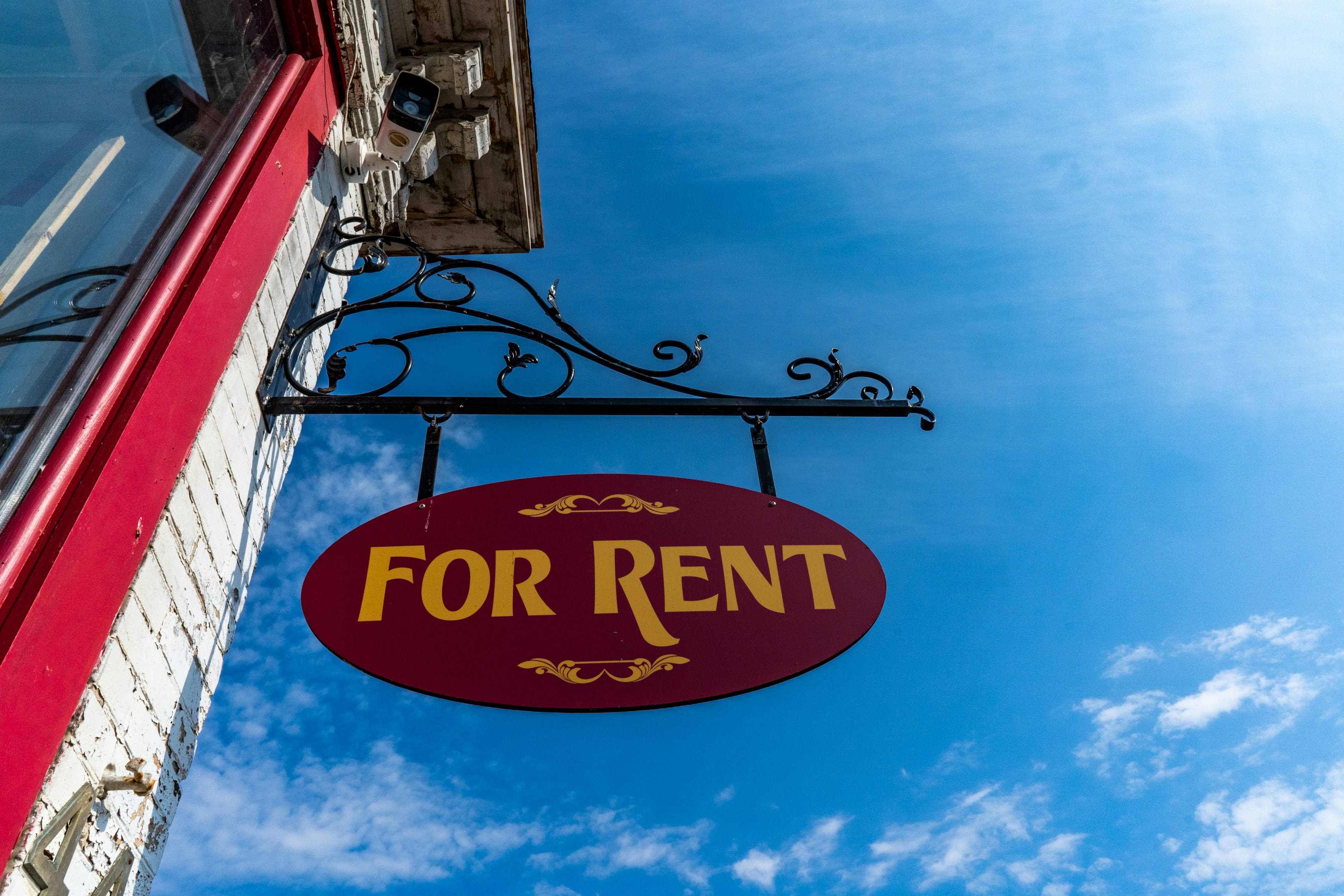 'For Rent' sign in front of property financed through crowdfunding.