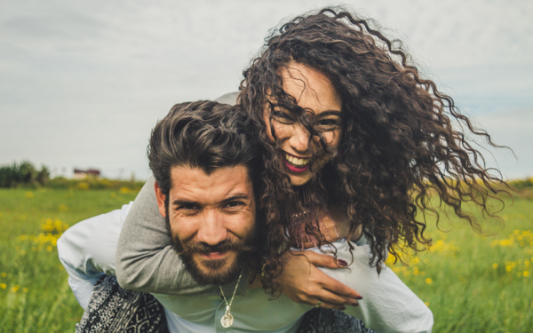 Happy couple enjoying better sex life.