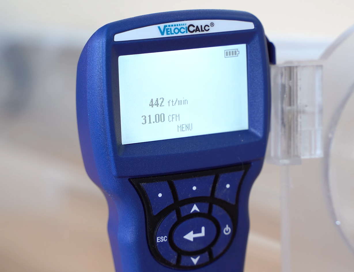 airflow meter showing air movement of Dyson V8 cordless stick vacuum