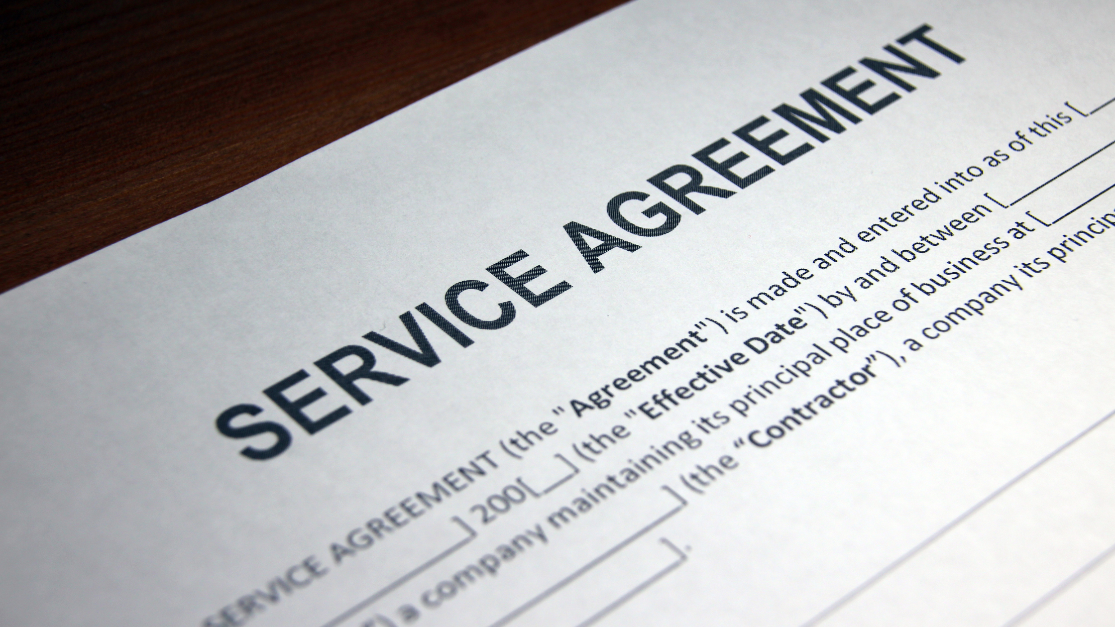 Service level agreements on desk, highlighting uptime, and ongoing maintenance expectations from VoIP telephony providers.