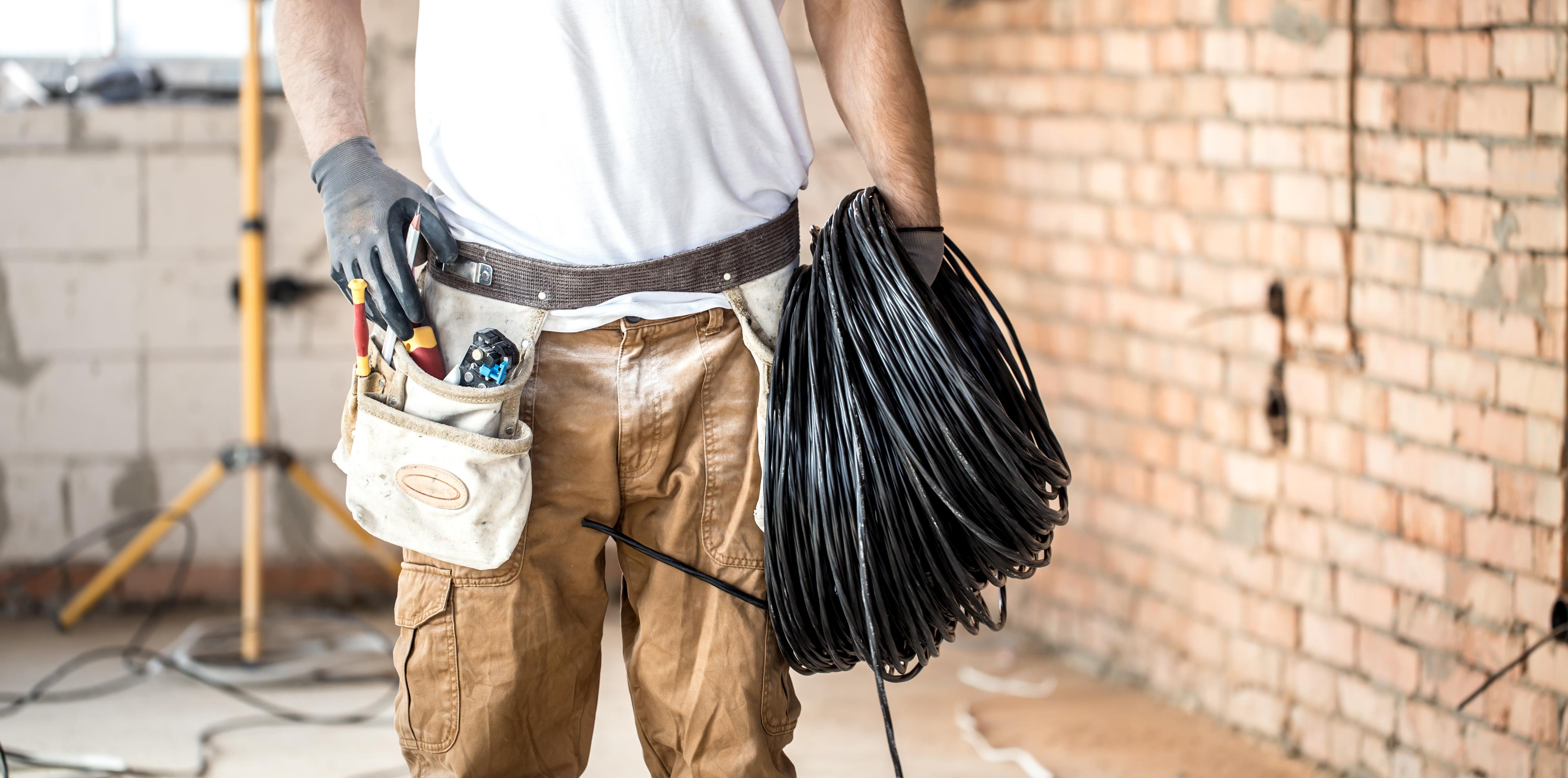 Electrician with tools