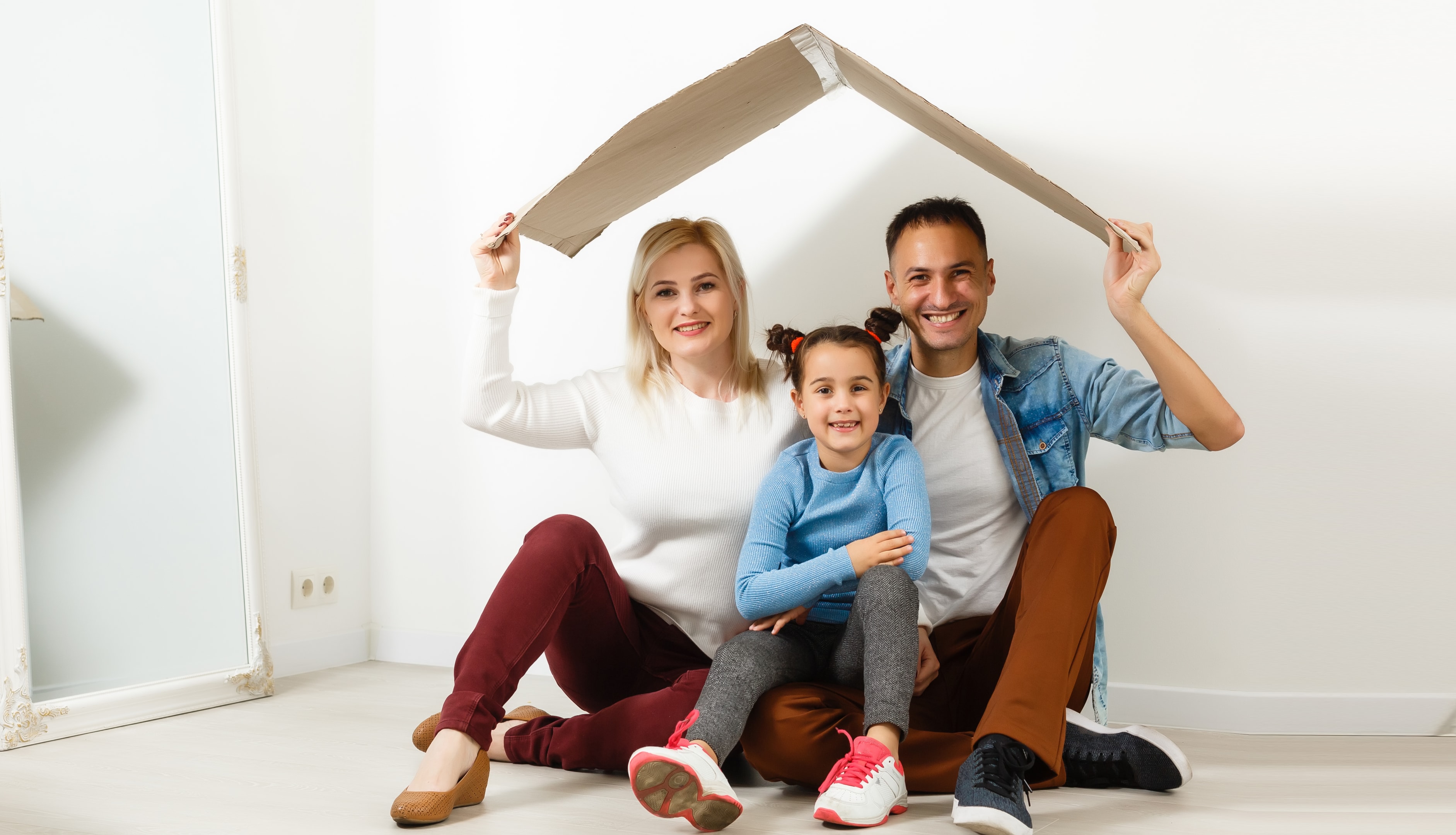 concept housing a young family. Mother father and child in new house with a roof at a home, industry, townhouses, create apartments, create cent 