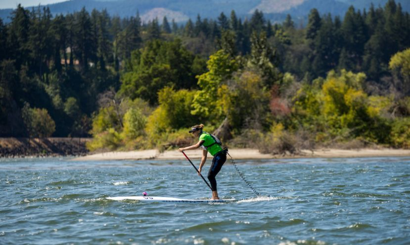 woman on a stand up paddle board