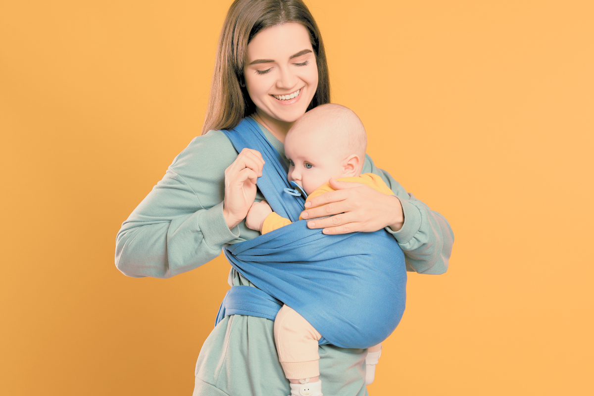 Mom wearing baby with cloth wrap