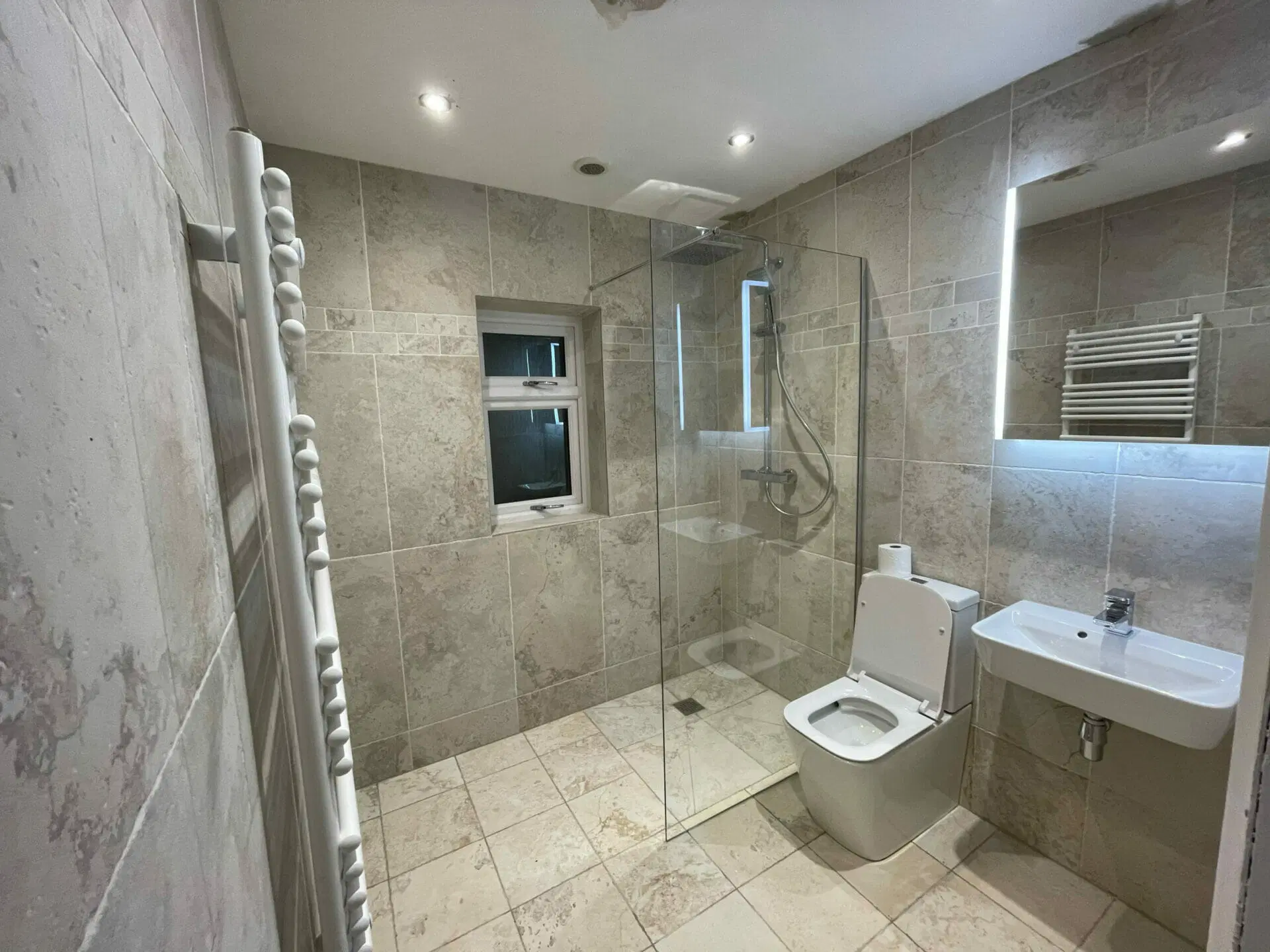 Instone range in Bone from Edimax. If you are working with a small room, stay away from dark tiles and dark colours. Instead opt for white or neutral hue in your bathroom design.