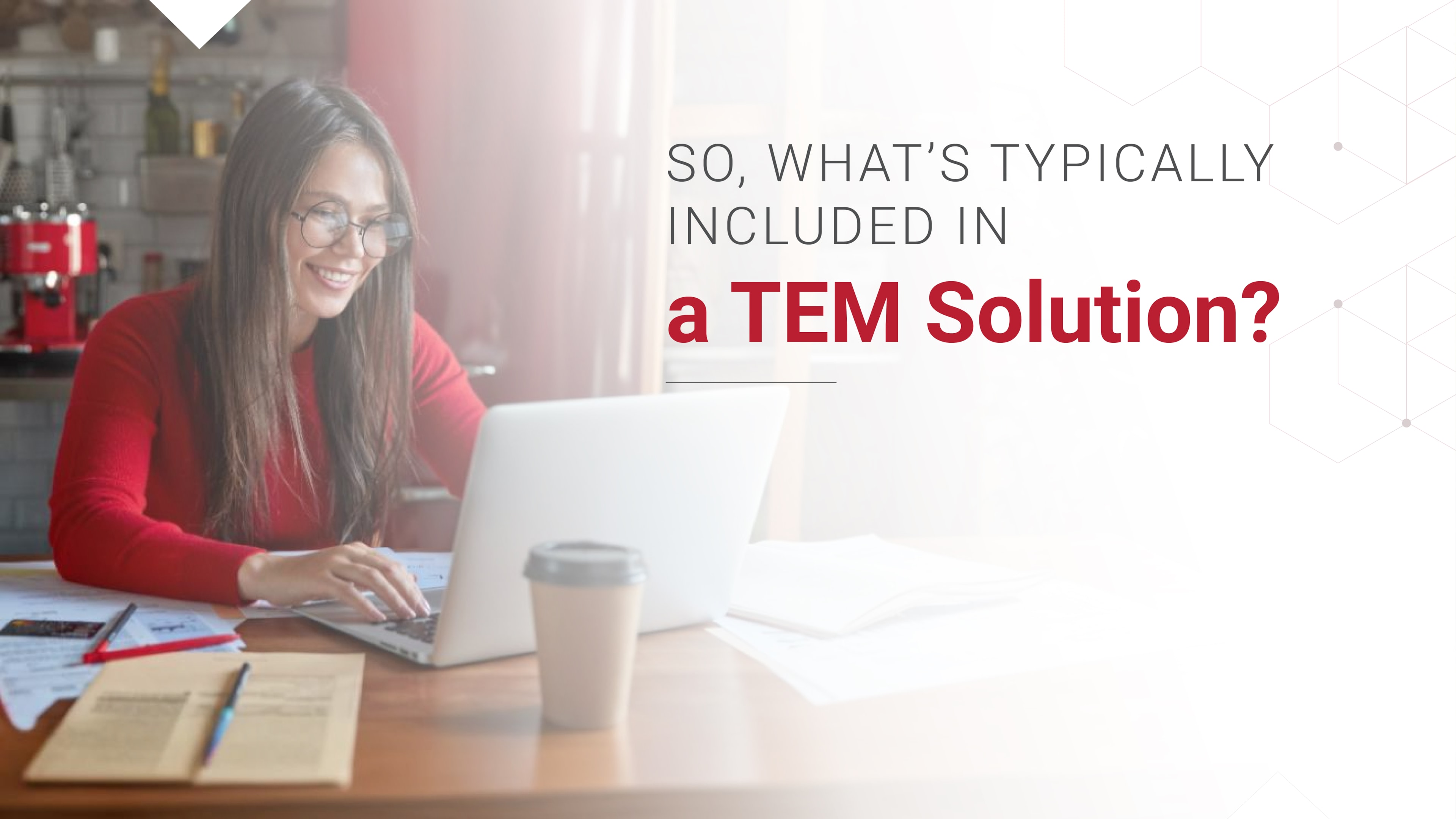 Woman in a red sweater working on a laptop, introducing what's included in a TEM (Telecom Expense Management) solution.