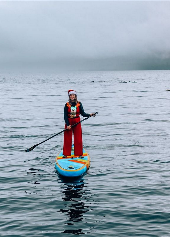 woman on inflatable paddle board