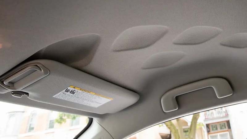 Car headliner with an indented design