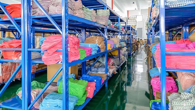 Stacks of microfiber towels on the Manywell factory floor