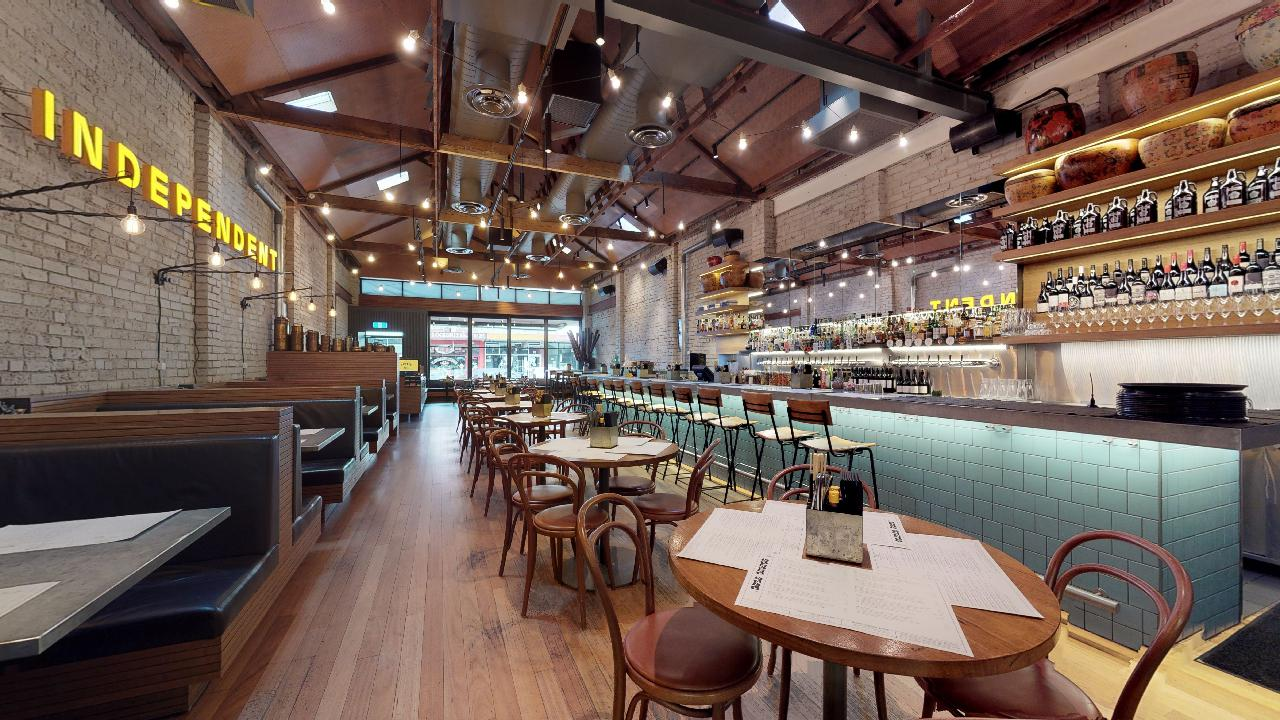 Vibrant and lively dining ambiance of Hawker Hall in Melbourne.