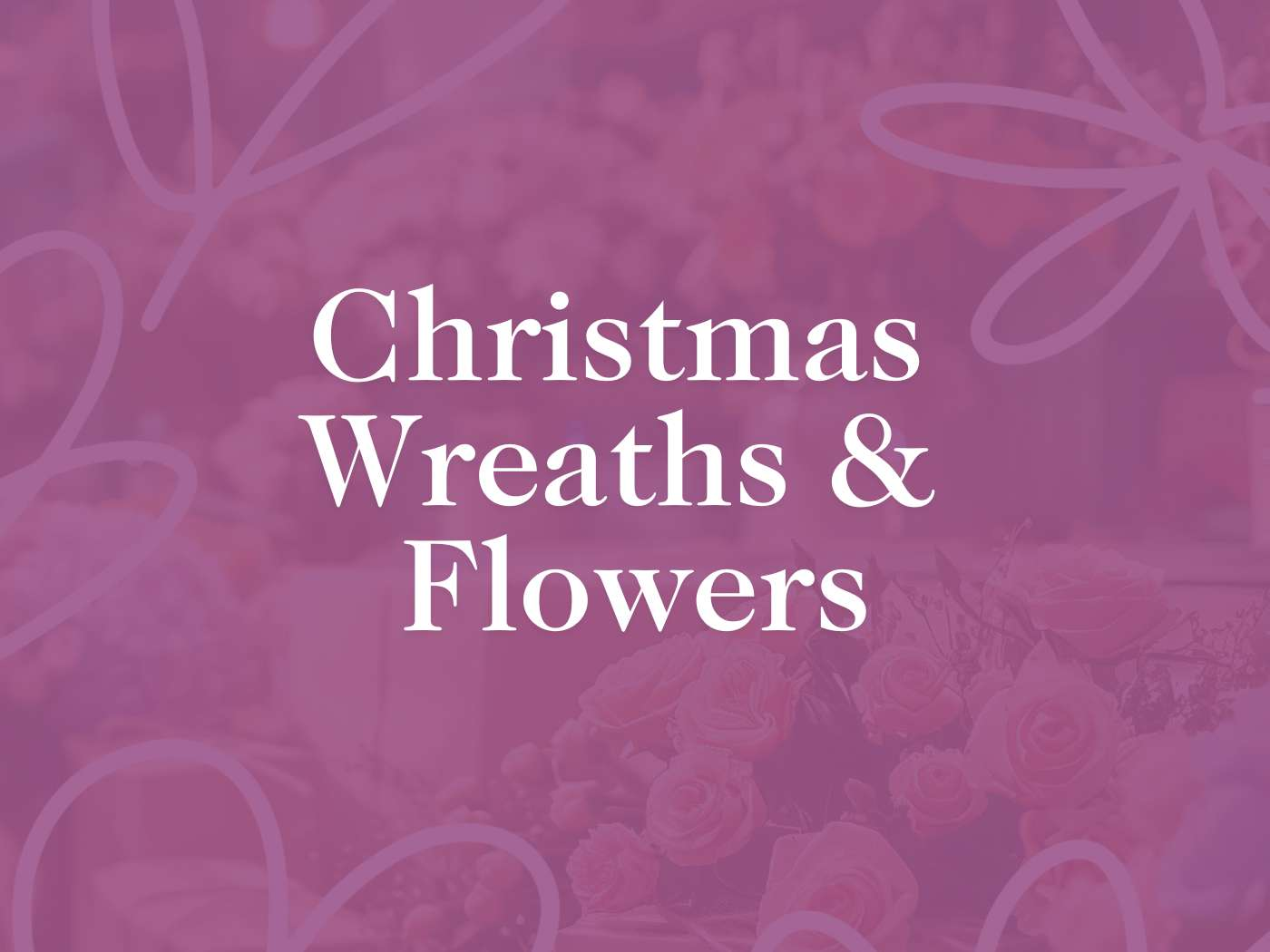 Alt text: "The text 'Christmas Wreaths & Flowers' overlaid on a soft-focus background of roses, conveying a range of festive floral arrangements for the holiday season, part of the exclusive collection at Fabulous Flowers and Gifts.