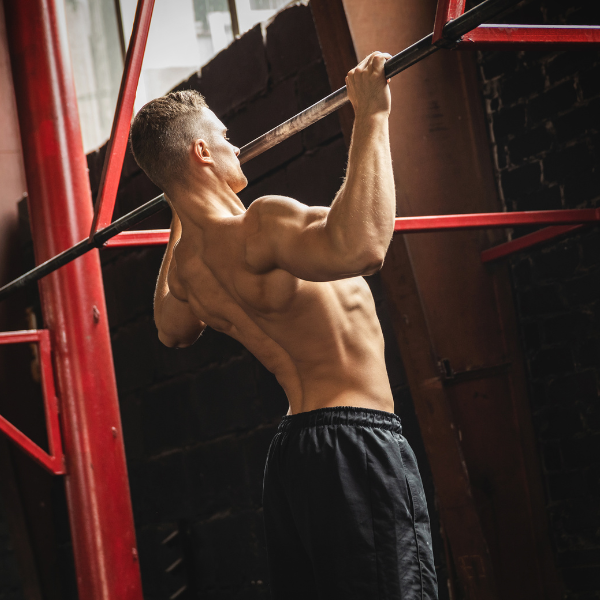Image showing a person doing wide-grip pull-ups.