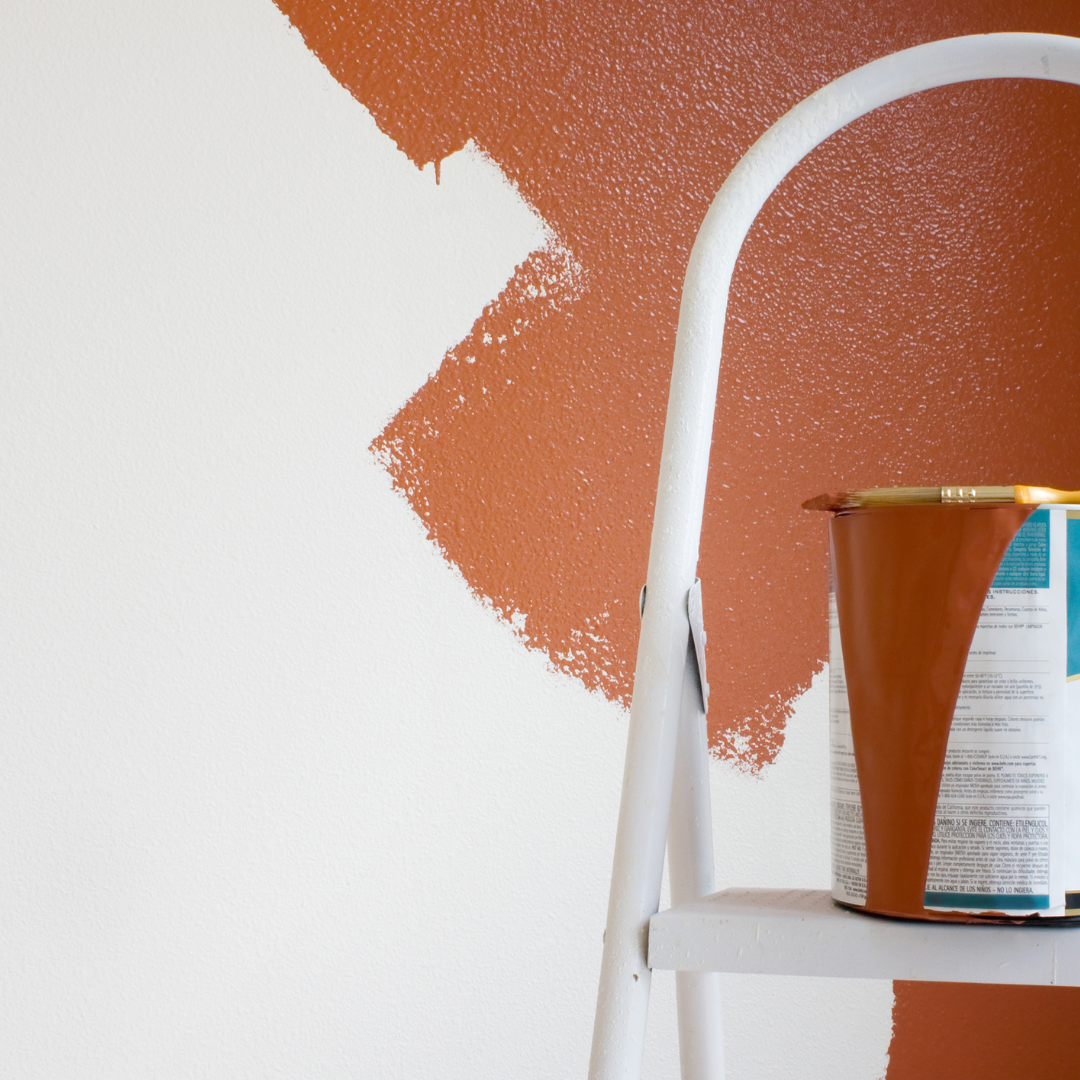 paint bucket with paint on the walls