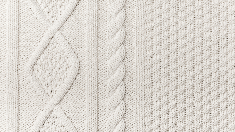 A close up of a knitted Pima cotton blanket