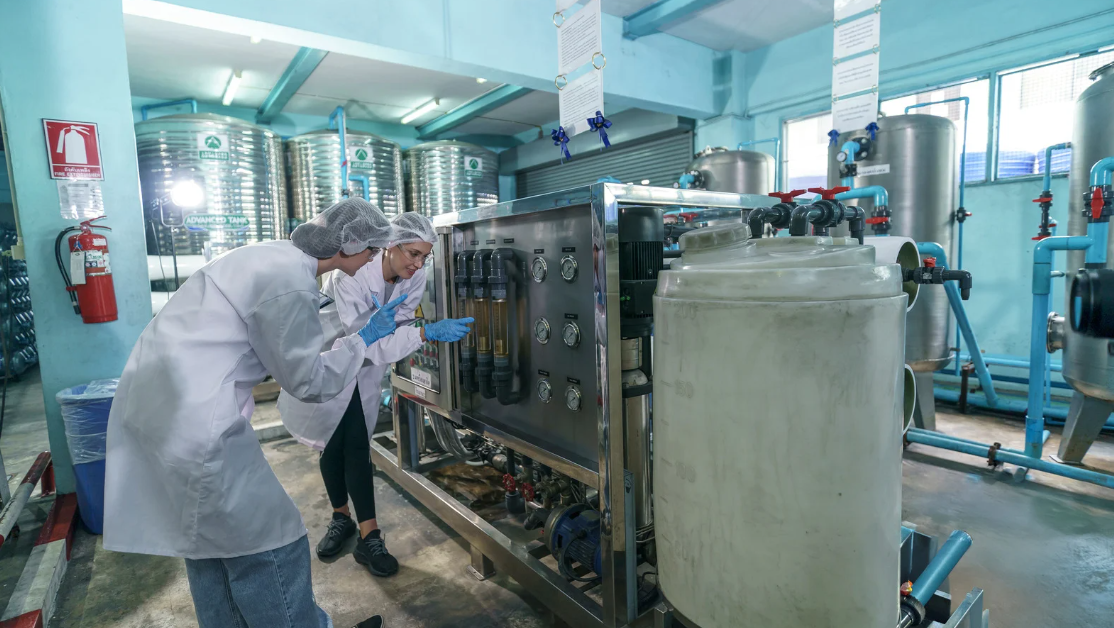 Industrial application of pH control chemicals in water treatment systems