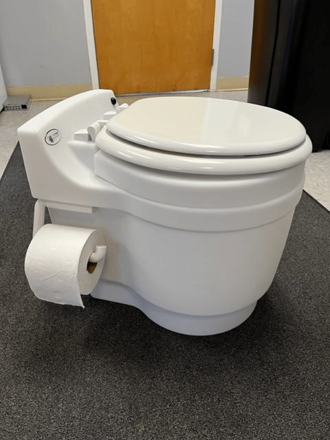 Laveo Dry Flush Toilet  –– With Power Options and Charger Cable