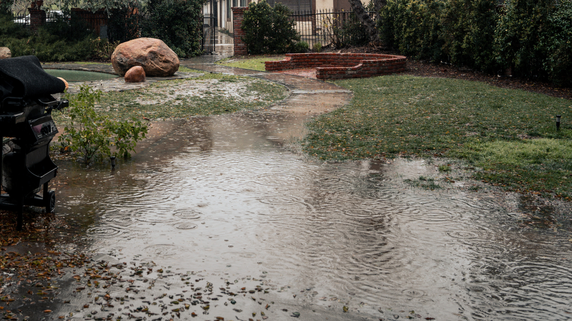 A property owner finds low-lying areas of their land flooding.