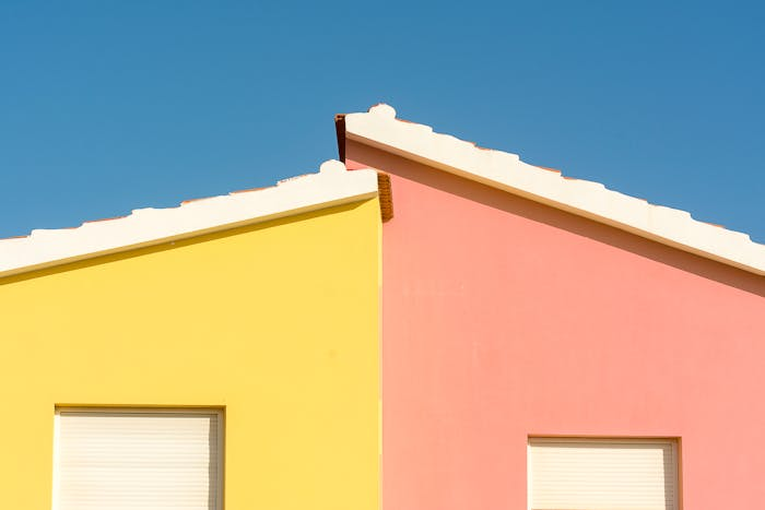 Yellow and pink houses in local vacation rental market