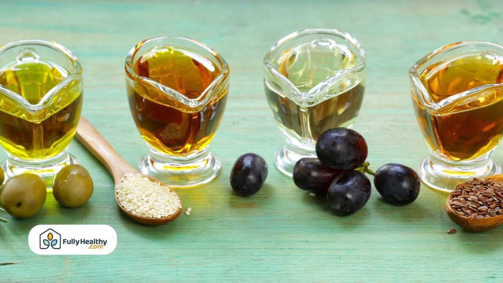 Assorted cooking oils on small glass jars with olives, sesame, flax, and grapes.