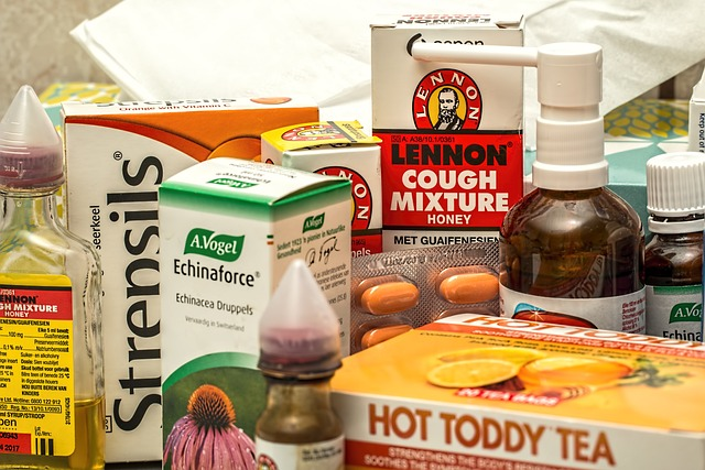 An image of natural remedies to treat a sore throat, including hot toddy tea and lozenges.