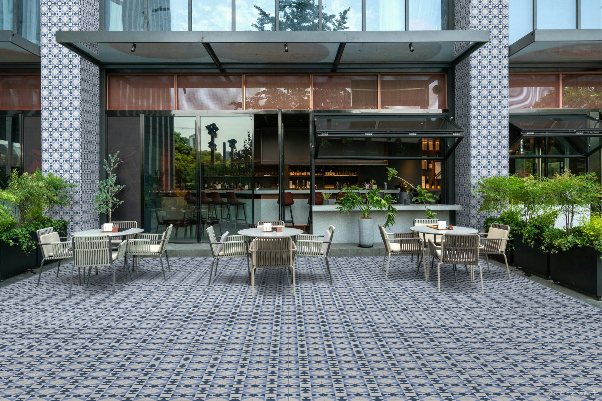 A display of encaustic tiles in a London showroom, showcasing their vibrant patterns.