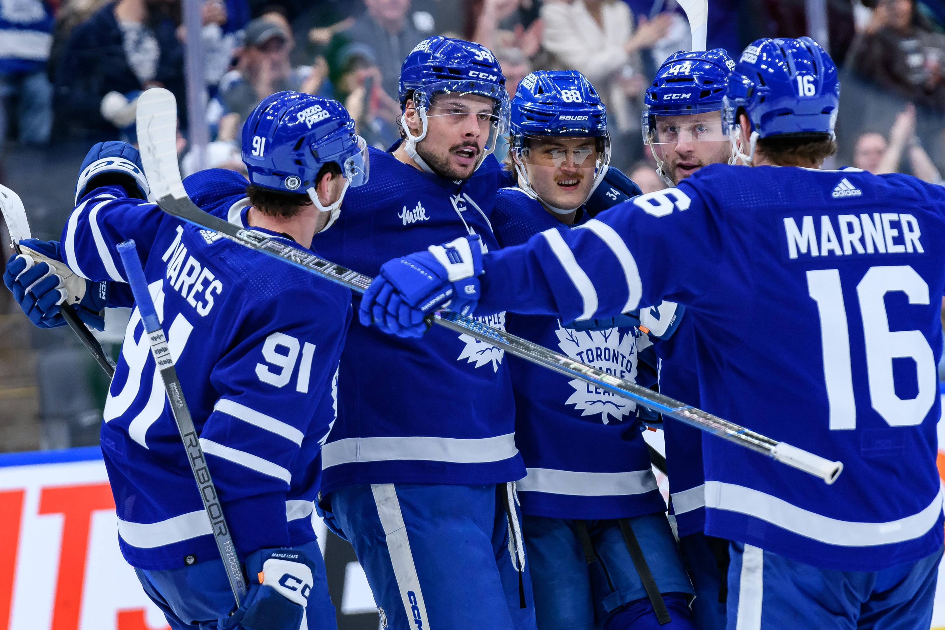 Toronto Maple Leafs Center Auston Matthews celebrates his 69th goal of the season with his team mates during the second period of the NHL regular season game between the Detroit Red Wings and the Toronto Maple Leafs on April 13, 2024, at Scotiabank Arena in Toronto, ON, Canada.