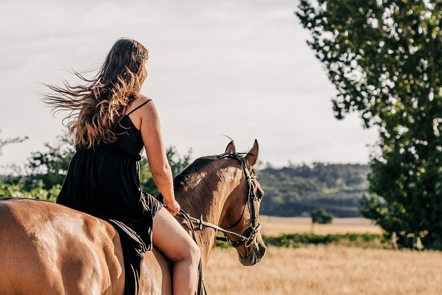 Woman Riding Horseback