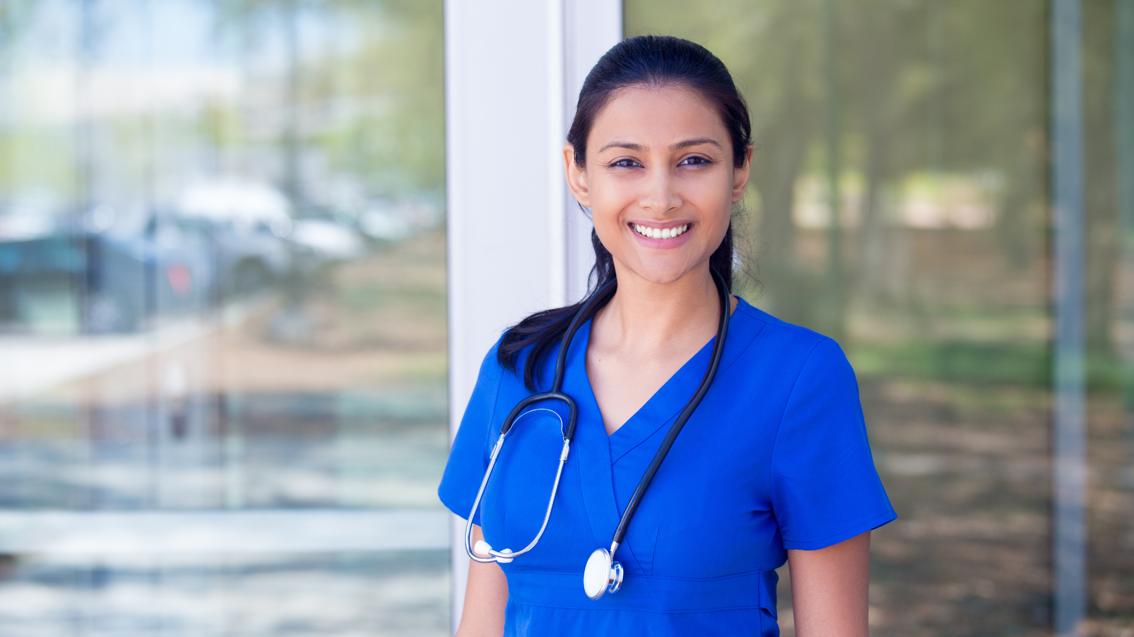 portrait of a happy female doctor