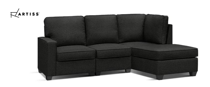An Artiss black three seater modular sofa with a chaise lounge.