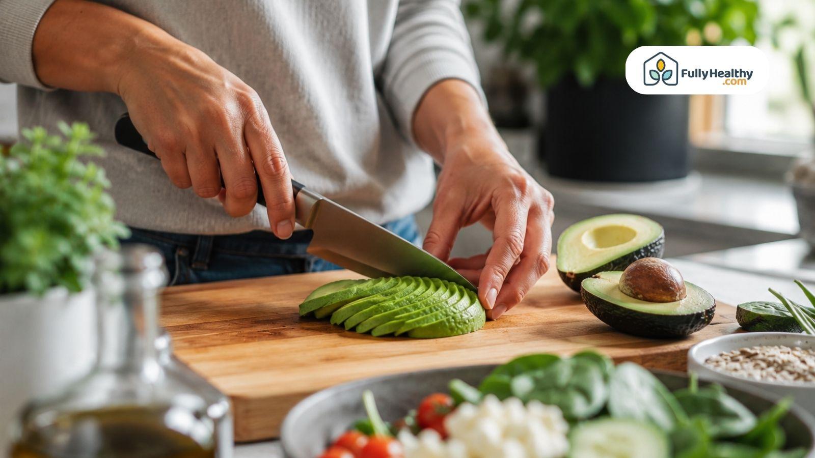 Fresh avocado slices prepared in a modern kitchen with healthy ingredients and natural morning light.