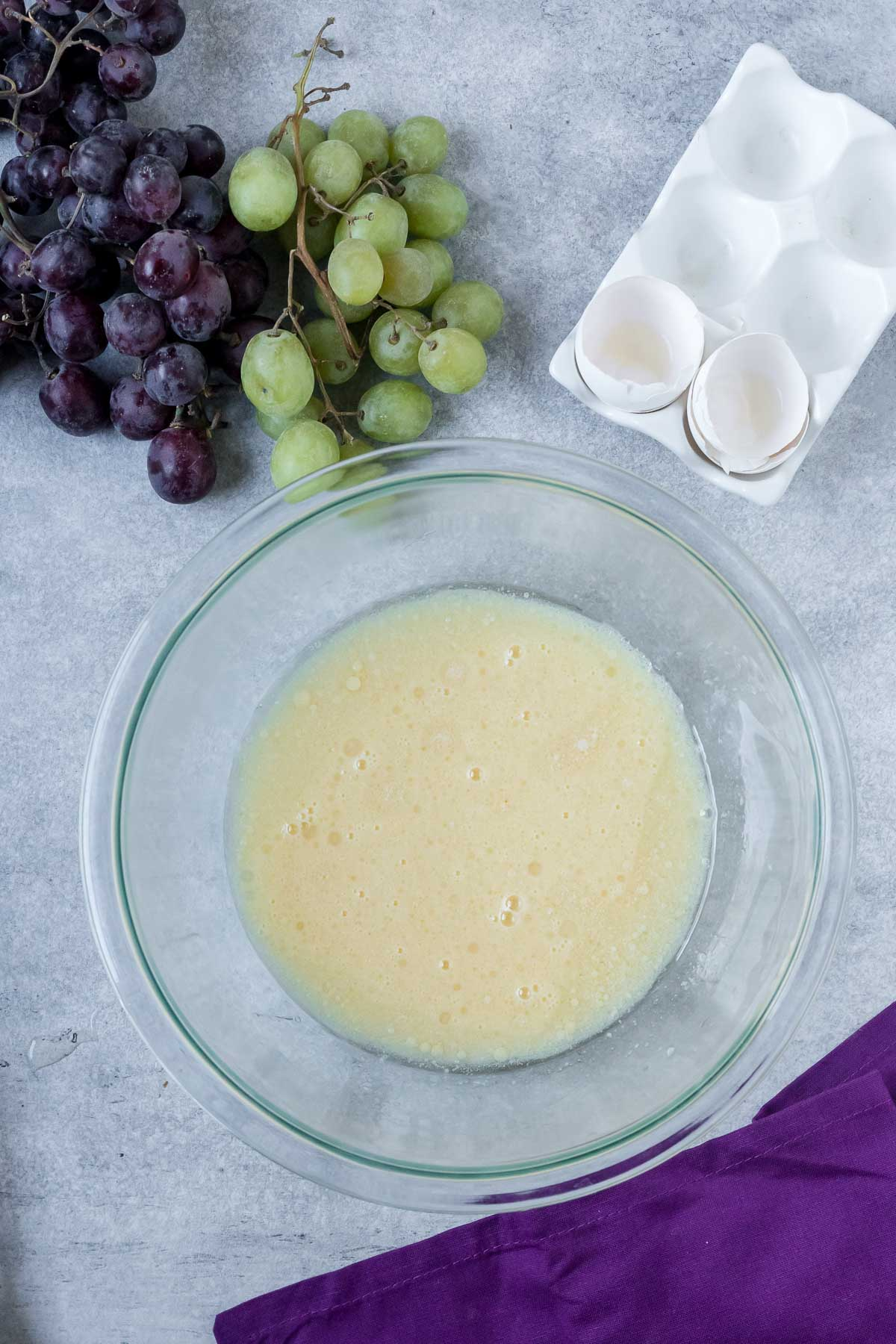 grape bread wet ingredients in a bowl