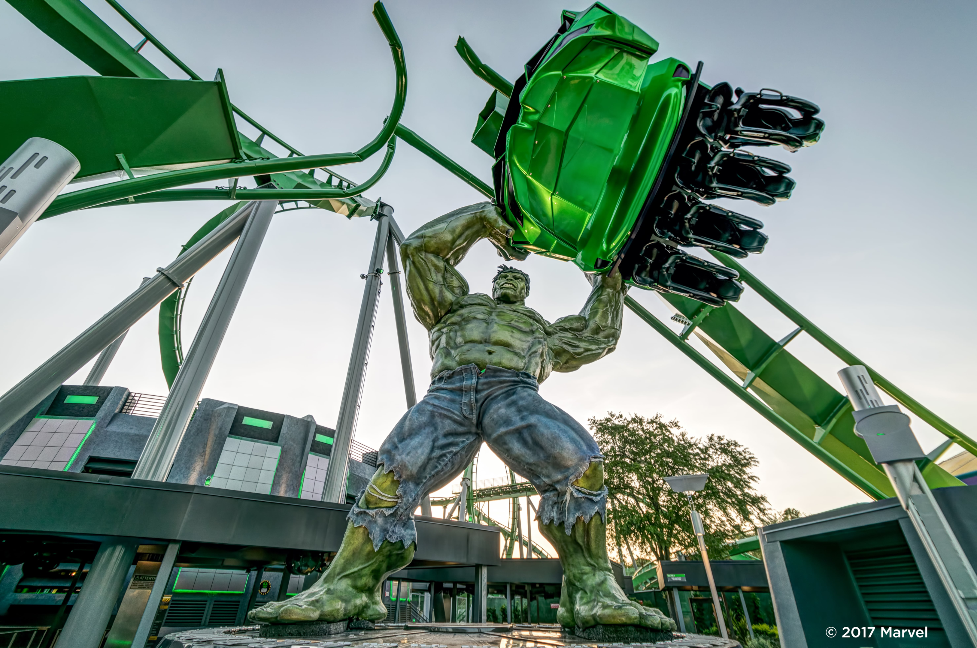 Hulk themed roller coaster with Hulk sculpture