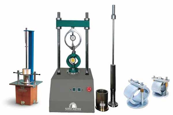 Various asphalt testing equipment on a laboratory table