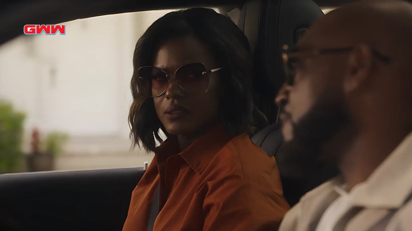 Cassandra Freeman and Adrian Holmes talk seriously inside car in Bel-Air episode