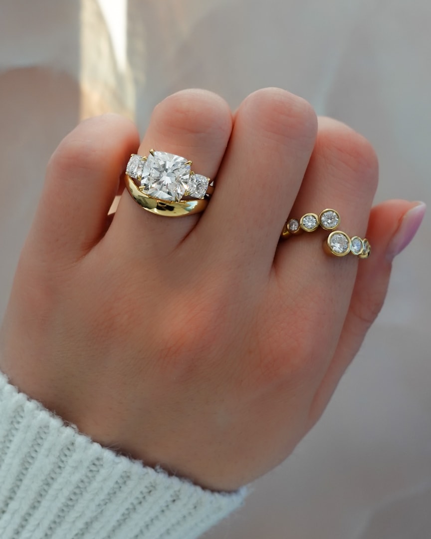 triad engagement ring with cushion cuts