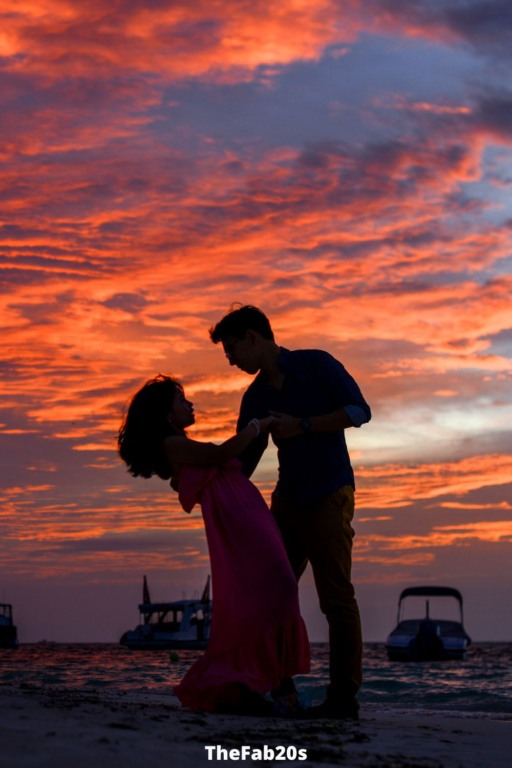 Couple dancing at sunset - Featured In Signs An Older Man Is Falling In Love With You