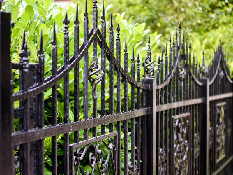 An image showing elegant wrought iron and aluminum fences.